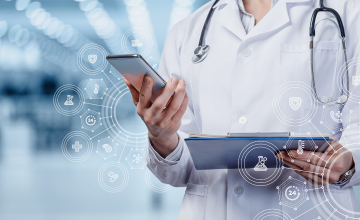 a doctor looks at a medical chart